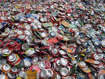 pile of crushed beer cans